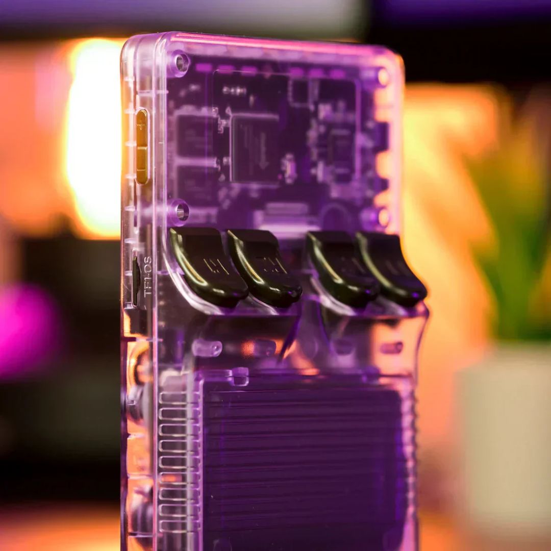 Clear electronic device with purple tint on a blurred colorful background