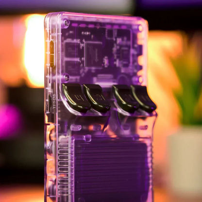 Clear electronic device with purple tint on a blurred colorful background